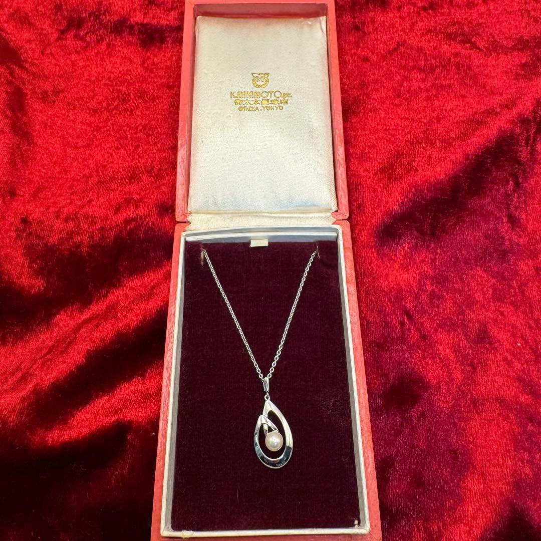 Mikimoto Akoya pearl necklace with silver teardrop pendant, silver chain, and red storage box