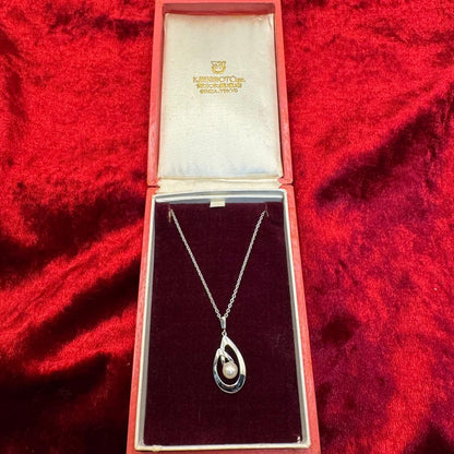 Mikimoto Akoya pearl necklace with silver teardrop pendant, silver chain, and red storage box