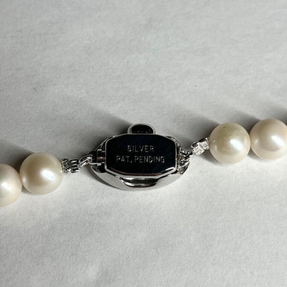 Akoya pearl long necklace measuring 81cm with 7.0 to 7.5mm round pearls