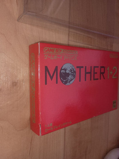 Nintendo MOTHER1+2 game cartridge unopened in plastic case with damaged box