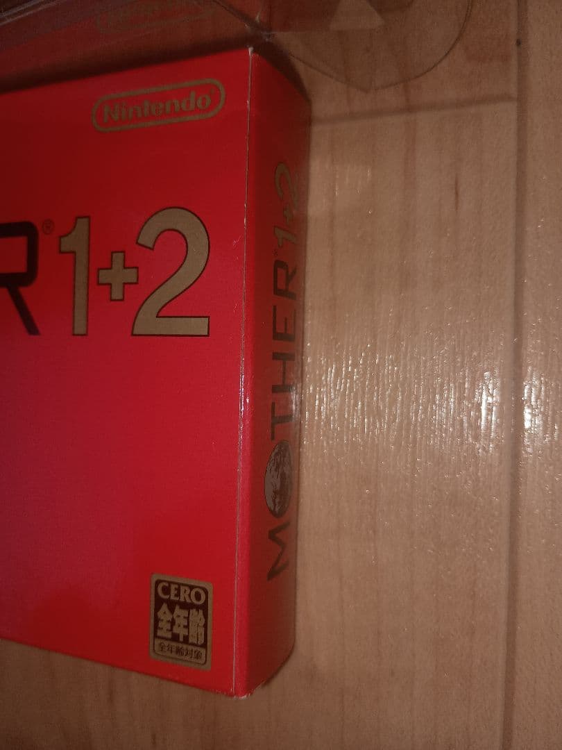 Nintendo MOTHER1+2 game cartridge unopened in plastic case with damaged box