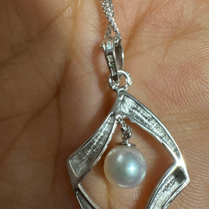 Akoya pearl silver necklace with pinkish luster pearls and silver chain, used condition, engraving on top