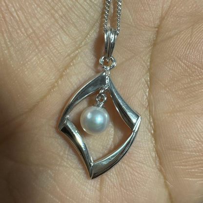 Akoya pearl silver necklace with pinkish luster pearls and silver chain, used condition, engraving on top