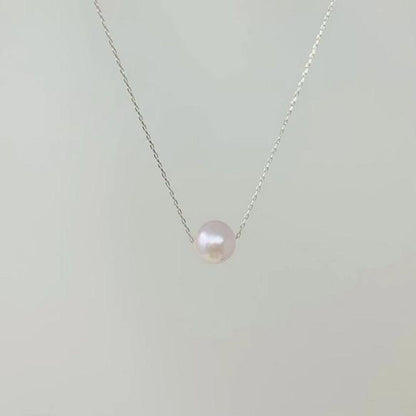 PT850 platinum Akoya pearl piercing necklace with 7mm pearl and 40cm chain on white background