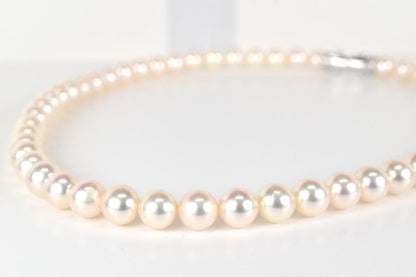 TASAKI Akoya pearl necklace with 53 pearls sized approximately 7.5 to 7.8mm and silver clasp