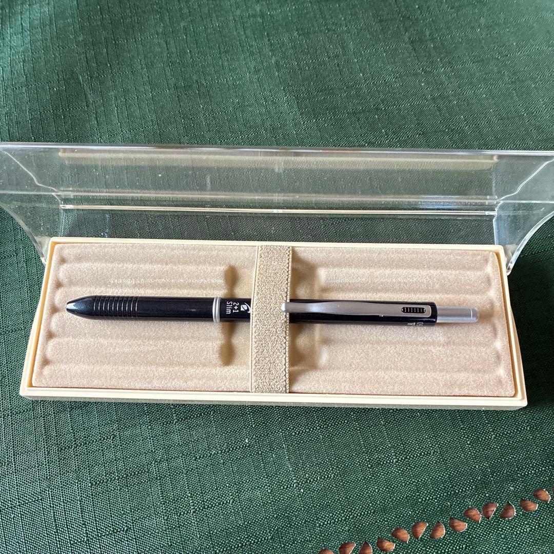 Pilot To plus One mechanical pencil and two-color ballpoint pens with visible storage wear