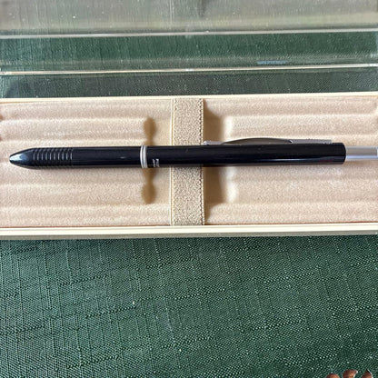 Pilot To plus One mechanical pencil and two-color ballpoint pens with visible storage wear