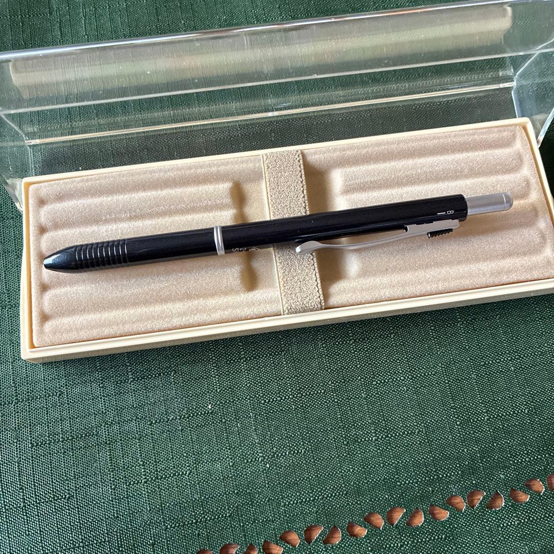 Pilot To plus One mechanical pencil and two-color ballpoint pens with visible storage wear