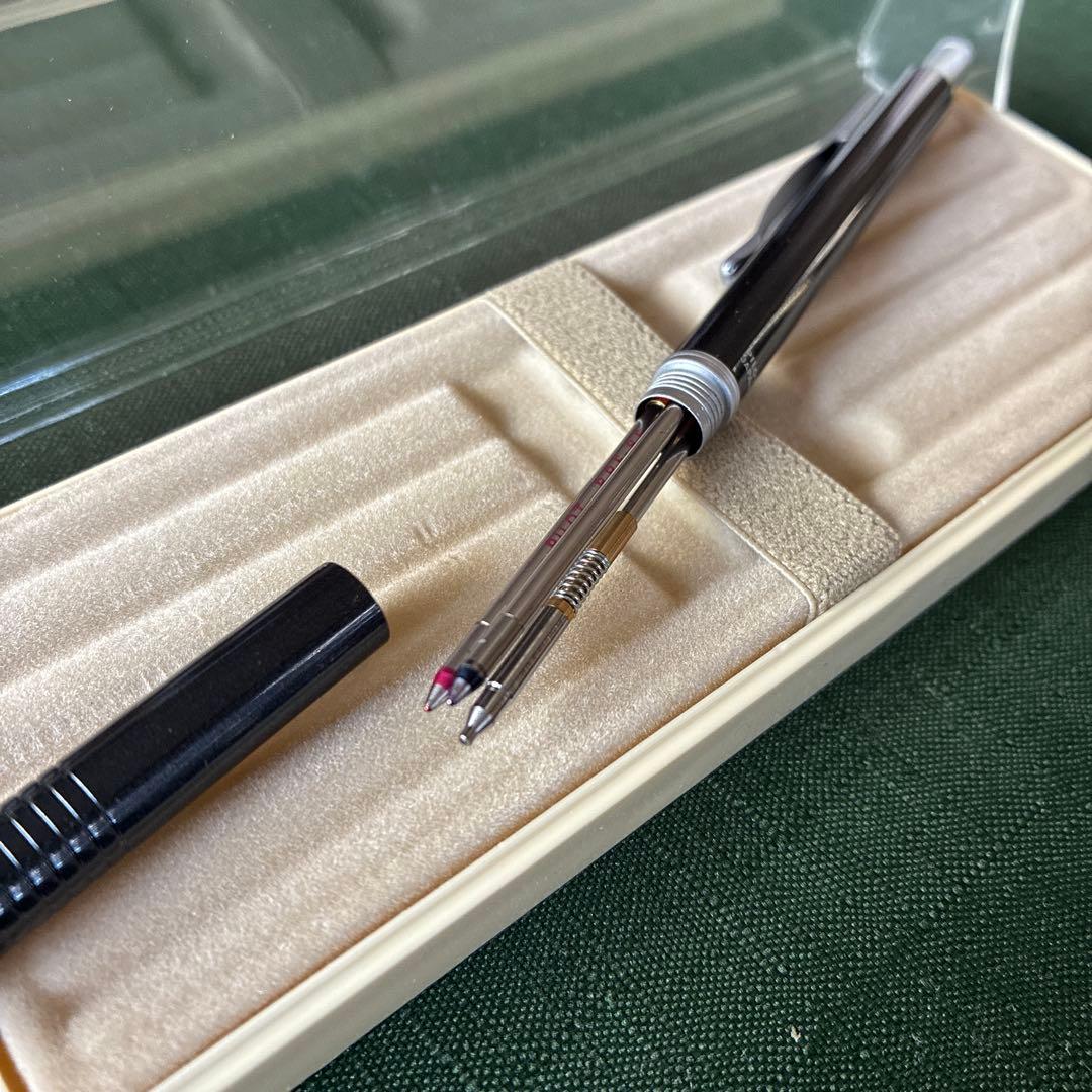 Pilot To plus One mechanical pencil and two-color ballpoint pens with visible storage wear