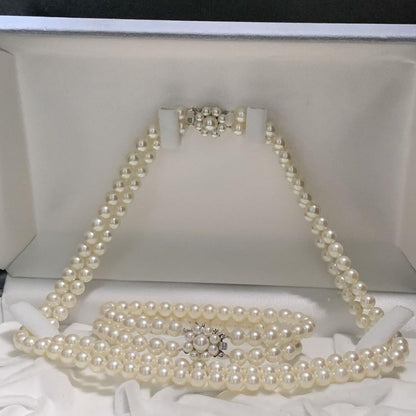 Two-strand long Tasaki Akoya pearl necklace with matching bracelet, pearls approximately 5.5-6.0mm, silver clasp