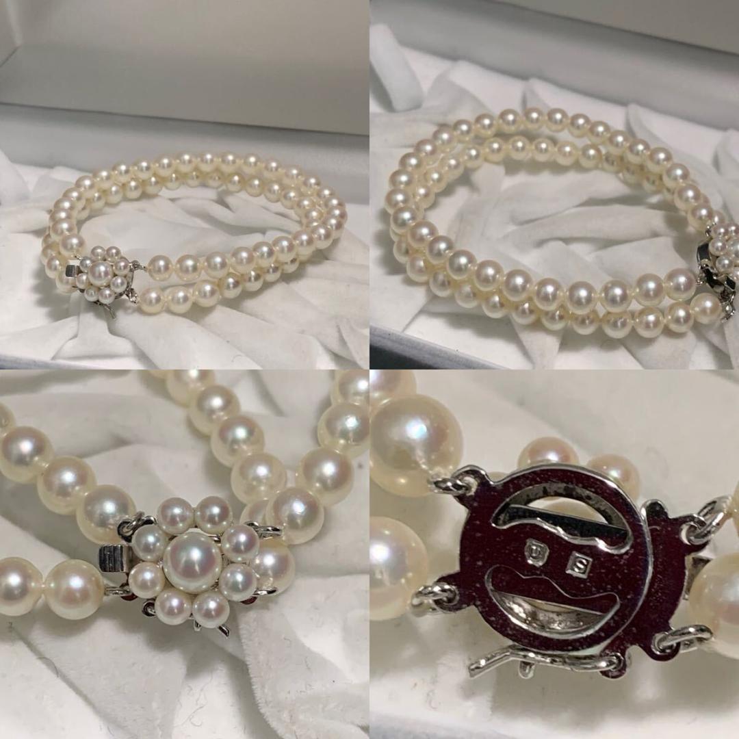 Two-strand long Tasaki Akoya pearl necklace with matching bracelet, pearls approximately 5.5-6.0mm, silver clasp