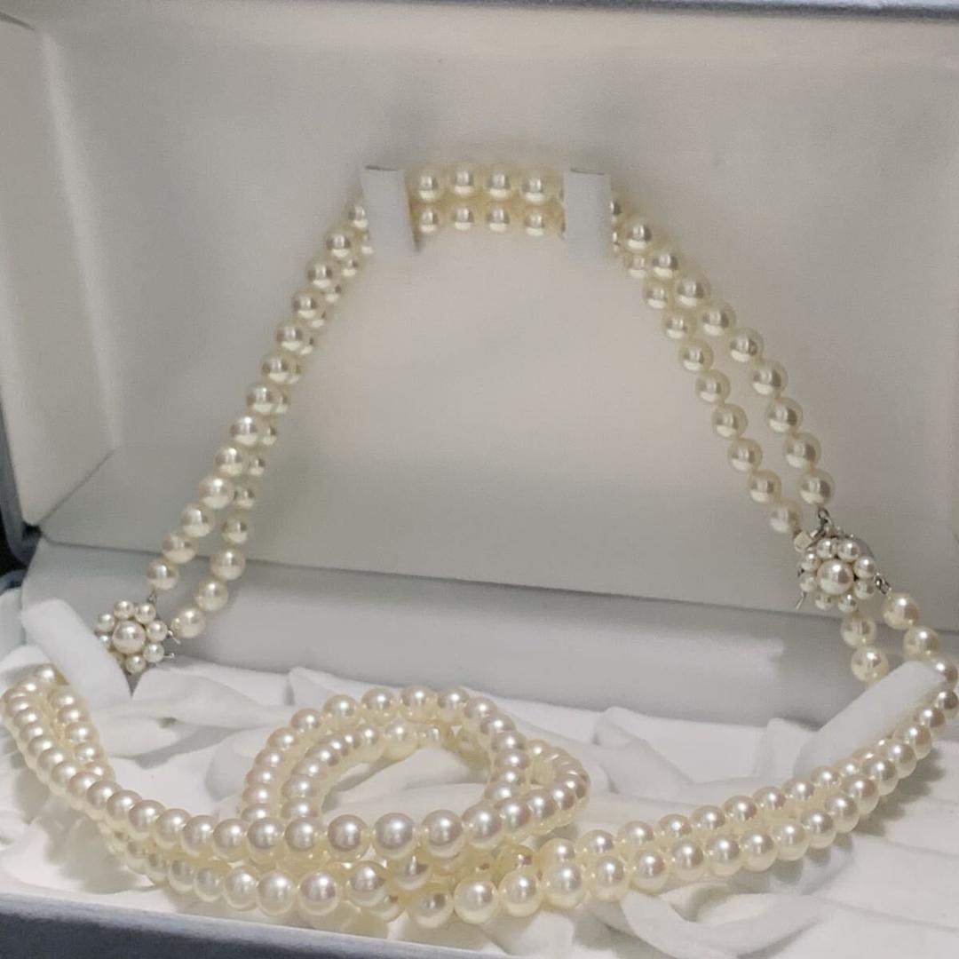 Two-strand long Tasaki Akoya pearl necklace with matching bracelet, pearls approximately 5.5-6.0mm, silver clasp