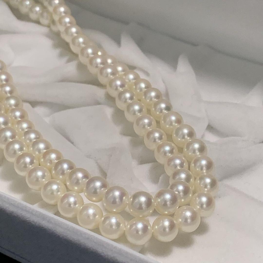 Two-strand long Tasaki Akoya pearl necklace with matching bracelet, pearls approximately 5.5-6.0mm, silver clasp