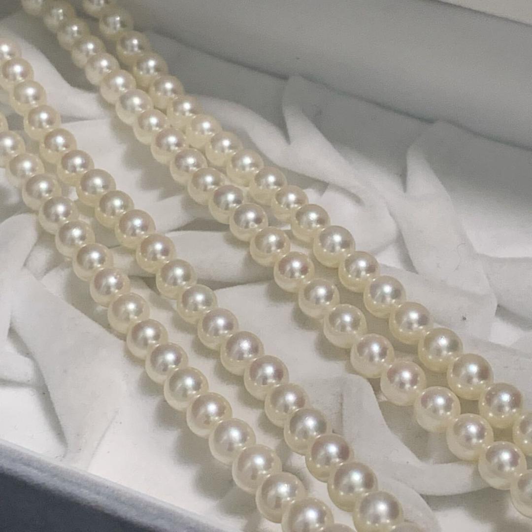 Two-strand long Tasaki Akoya pearl necklace with matching bracelet, pearls approximately 5.5-6.0mm, silver clasp