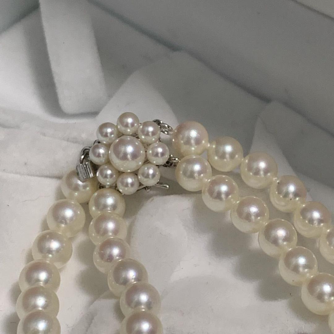 Two-strand long Tasaki Akoya pearl necklace with matching bracelet, pearls approximately 5.5-6.0mm, silver clasp