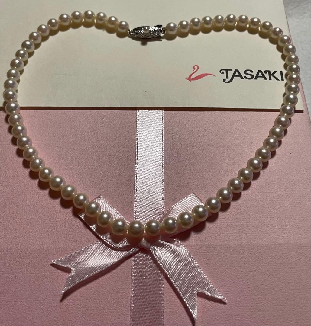 Antique Tasaki Akoya pearl necklace featuring 6.5mm round pearls on a 42cm string