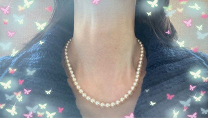 Antique Tasaki Akoya pearl necklace featuring 6.5mm round pearls on a 42cm string