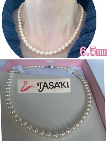Antique Tasaki Akoya pearl necklace featuring 6.5mm round pearls on a 42cm string