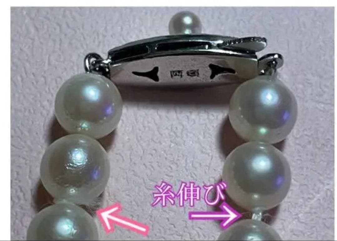 Antique Tasaki Akoya pearl necklace featuring 6.5mm round pearls on a 42cm string