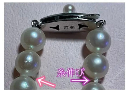 Antique Tasaki Akoya pearl necklace featuring 6.5mm round pearls on a 42cm string