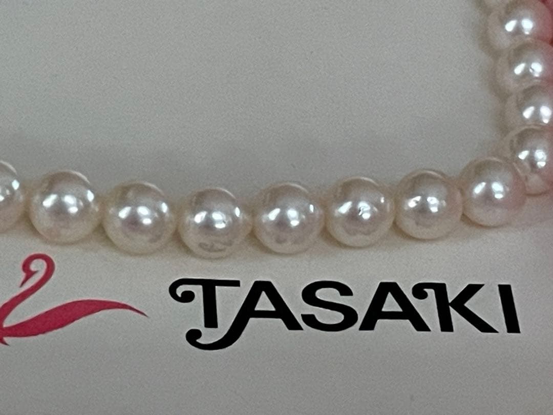 Antique Tasaki Akoya pearl necklace featuring 6.5mm round pearls on a 42cm string