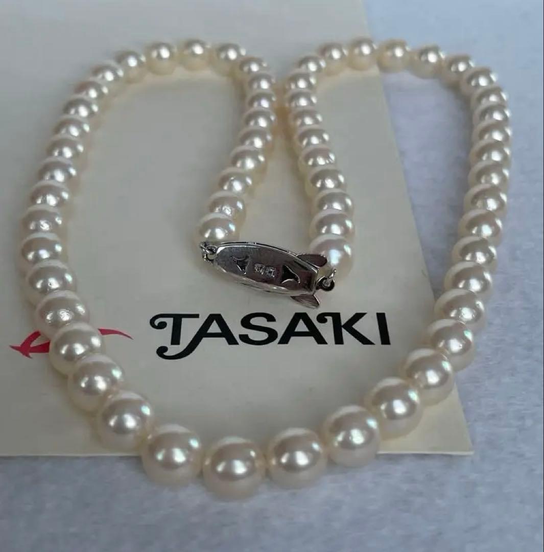 Antique Tasaki Akoya pearl necklace featuring 6.5mm round pearls on a 42cm string