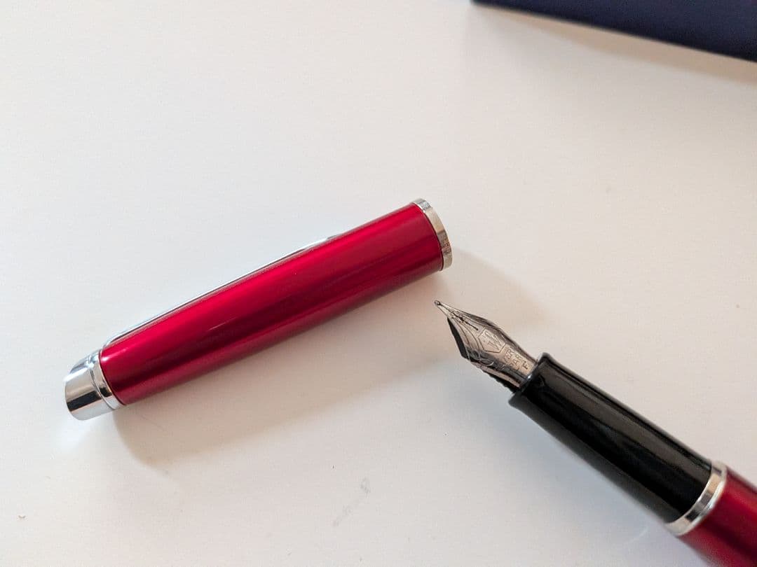 WATERMAN fountain pen with red body, stainless steel nib, and included dedicated case