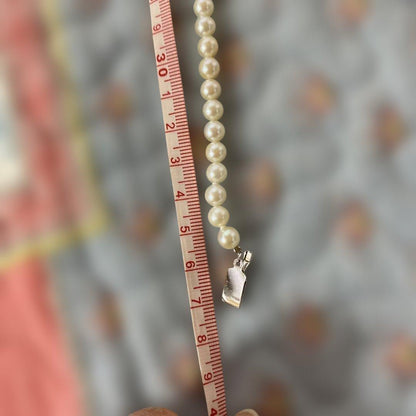 Akoya pearl necklace with approximately 5mm pearls on a 39cm silver chain