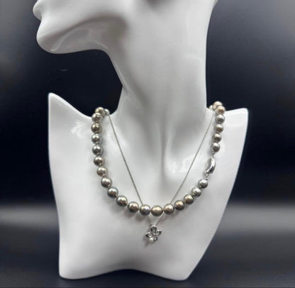 Tasaki Rakurie black pearl necklace with 3.7mm pearls and matching 6mm pearl earrings on sterling silver