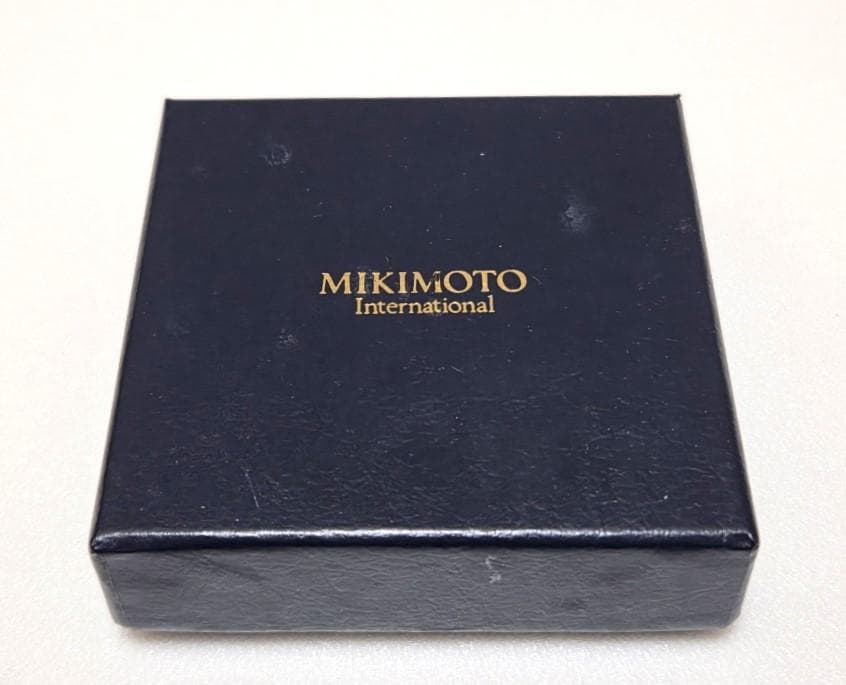 MIKIMOTO Pearl Pendant Loupe Long Necklace with pearl pendant displayed against white background with box