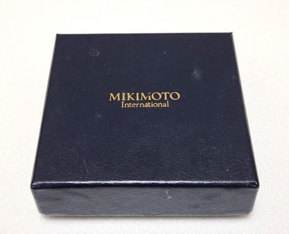 MIKIMOTO Pearl Pendant Loupe Long Necklace with pearl pendant displayed against white background with box