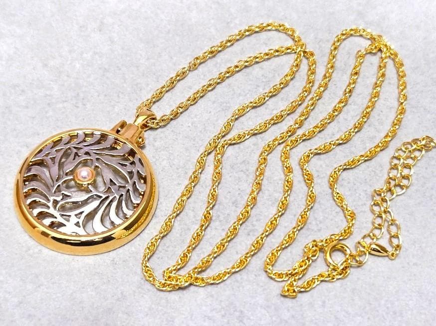 MIKIMOTO Pearl Pendant Loupe Long Necklace with pearl pendant displayed against white background with box