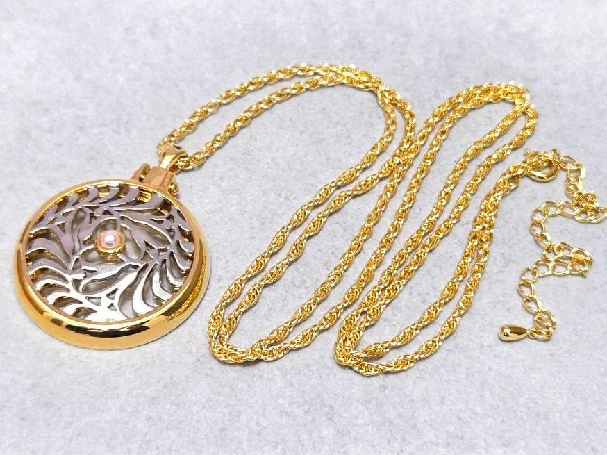 MIKIMOTO Pearl Pendant Loupe Long Necklace with pearl pendant displayed against white background with box