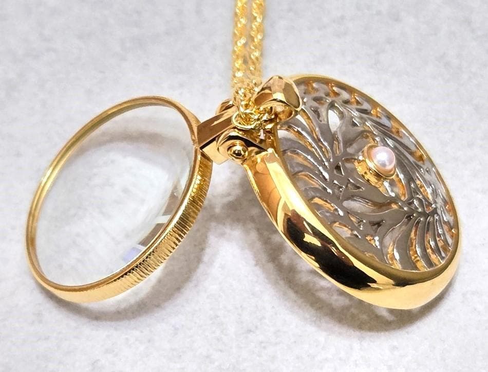 MIKIMOTO Pearl Pendant Loupe Long Necklace with pearl pendant displayed against white background with box