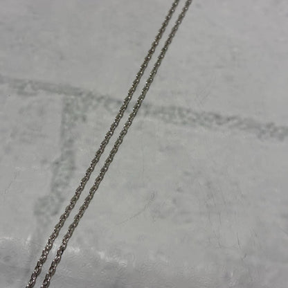 Mikimoto necklace featuring a silver white ribbon pendant with Akoya pearl on a 40 cm chain