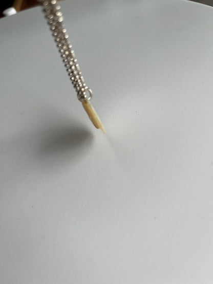 Agete shell necklace featuring natural shell pendant on delicate chain