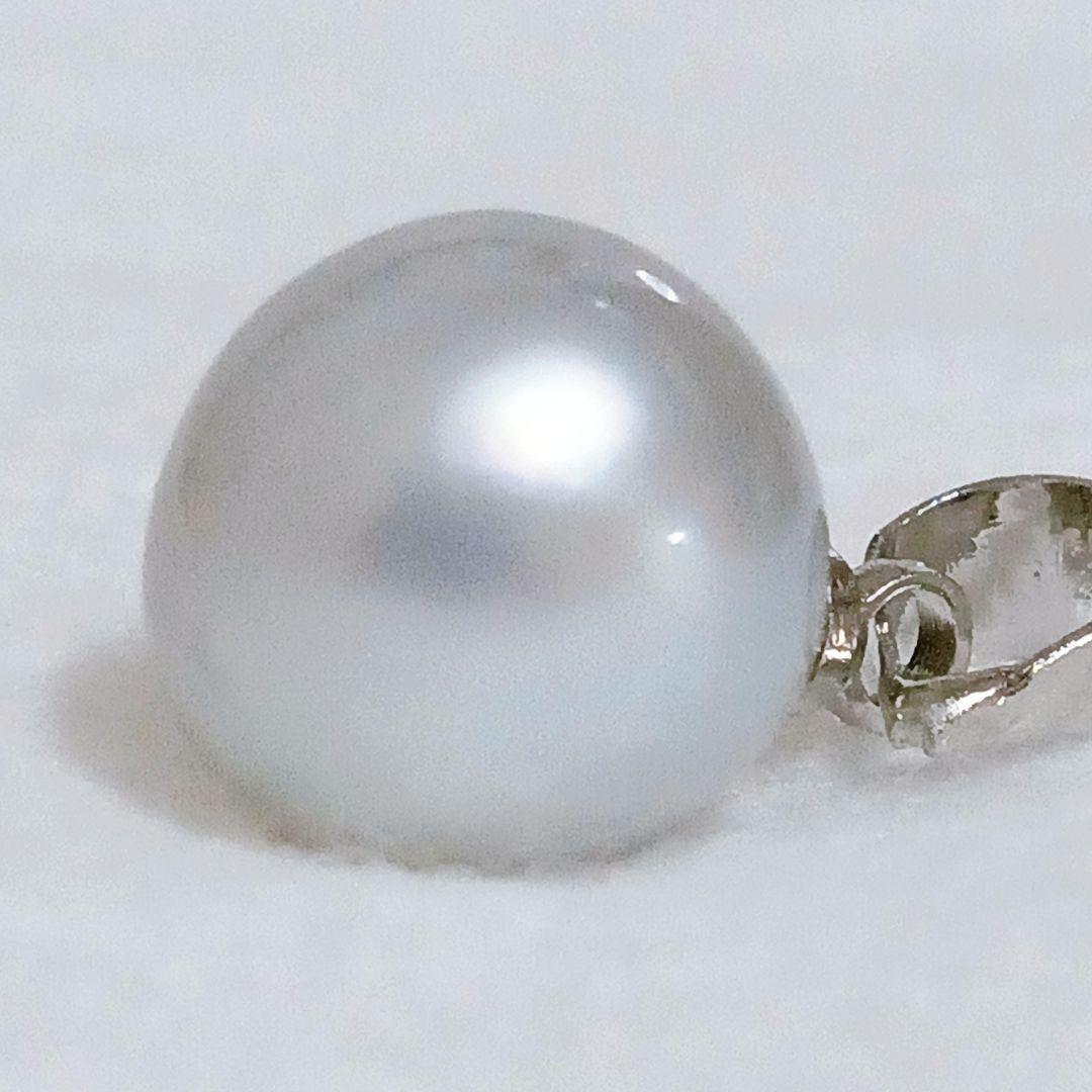 Akoya Pearl Top featuring 9.3mm natural pearl set in silver 925 with unique scratches, new condition