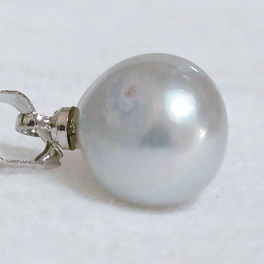 Akoya Pearl Top featuring 9.3mm natural pearl set in silver 925 with unique scratches, new condition
