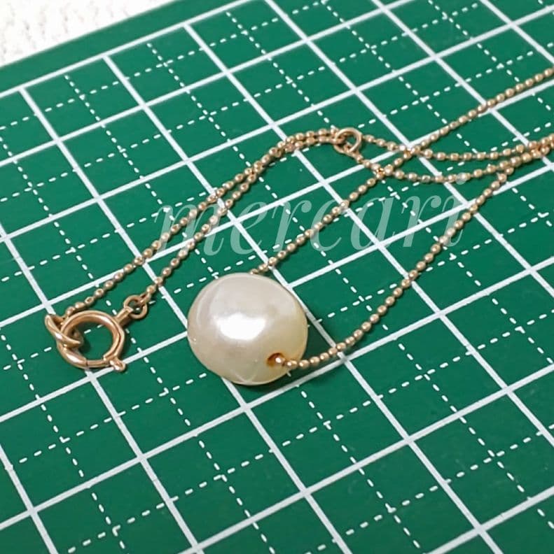 Agete pearl necklace with 10K gold ball chain and plump freshwater pearl featuring natural surface texture