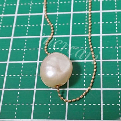 Agete pearl necklace with 10K gold ball chain and plump freshwater pearl featuring natural surface texture