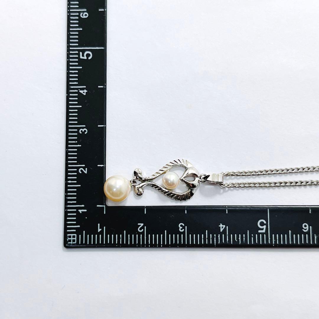 Vintage Mikimoto pearl necklace pendant with silver chain and 4.2-6.5mm pearls, 42 cm long