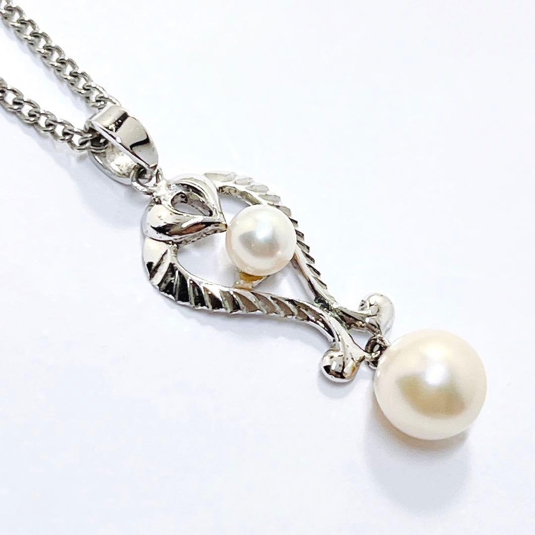 Vintage Mikimoto pearl necklace pendant with silver chain and 4.2-6.5mm pearls, 42 cm long