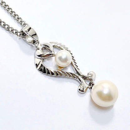 Vintage Mikimoto pearl necklace pendant with silver chain and 4.2-6.5mm pearls, 42 cm long