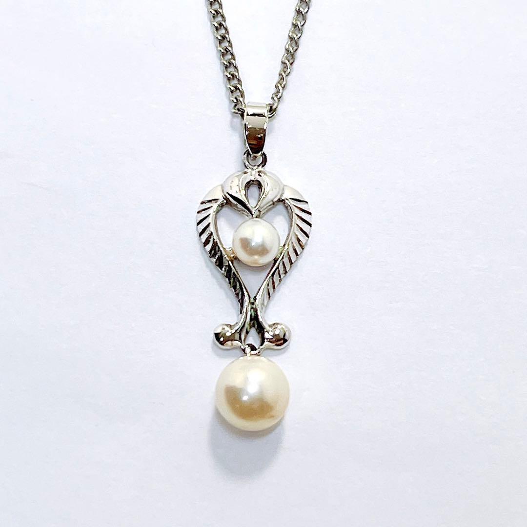 Vintage Mikimoto pearl necklace pendant with silver chain and 4.2-6.5mm pearls, 42 cm long
