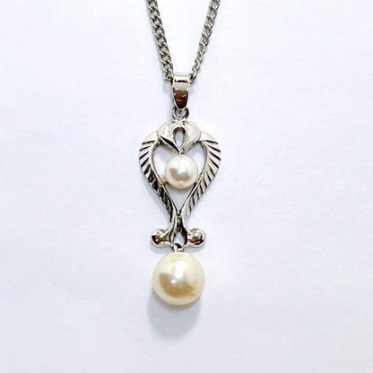 Vintage Mikimoto pearl necklace pendant with silver chain and 4.2-6.5mm pearls, 42 cm long
