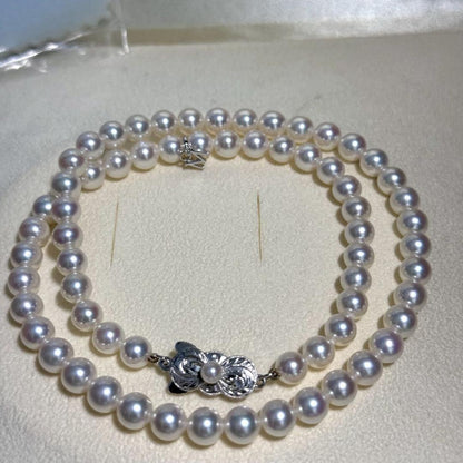 Mikimoto Akoya Pearl M Charm Necklace with 6.5mm pearl pendant and 44cm chain displayed with box