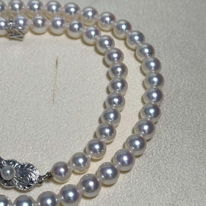 Mikimoto Akoya Pearl M Charm Necklace with 6.5mm pearl pendant and 44cm chain displayed with box