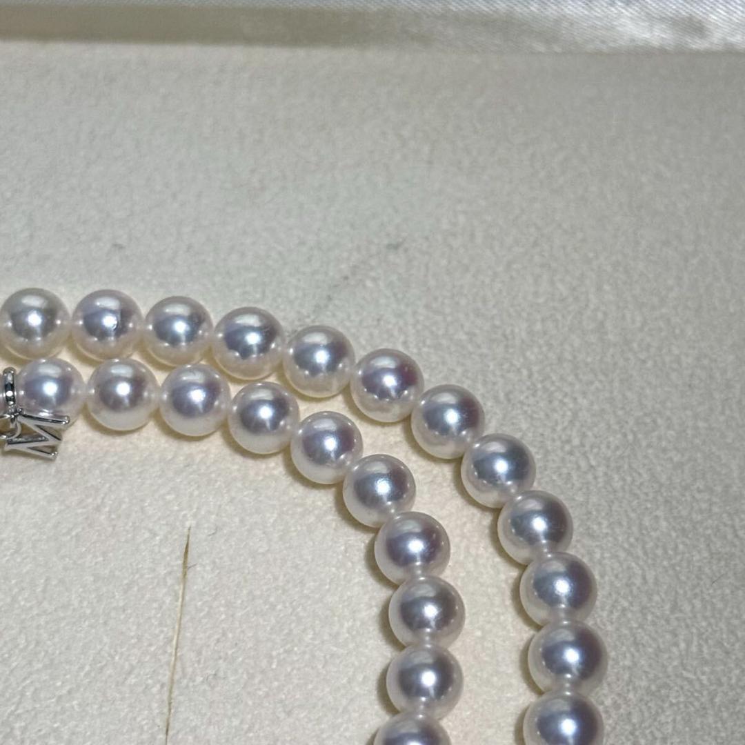 Mikimoto Akoya Pearl M Charm Necklace with 6.5mm pearl pendant and 44cm chain displayed with box