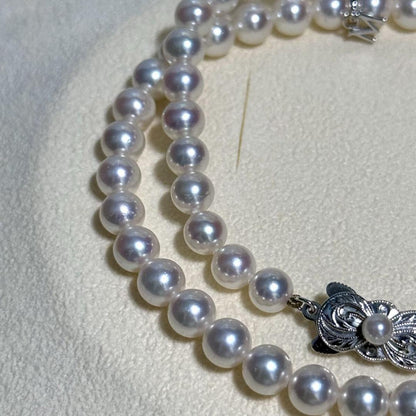Mikimoto Akoya Pearl M Charm Necklace with 6.5mm pearl pendant and 44cm chain displayed with box