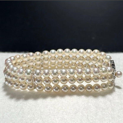 3-strand Akoya pearl bracelet with 5-5.5mm white to light pink pearls and silver clasp